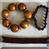 J10. Wood and leather bracelets. 
